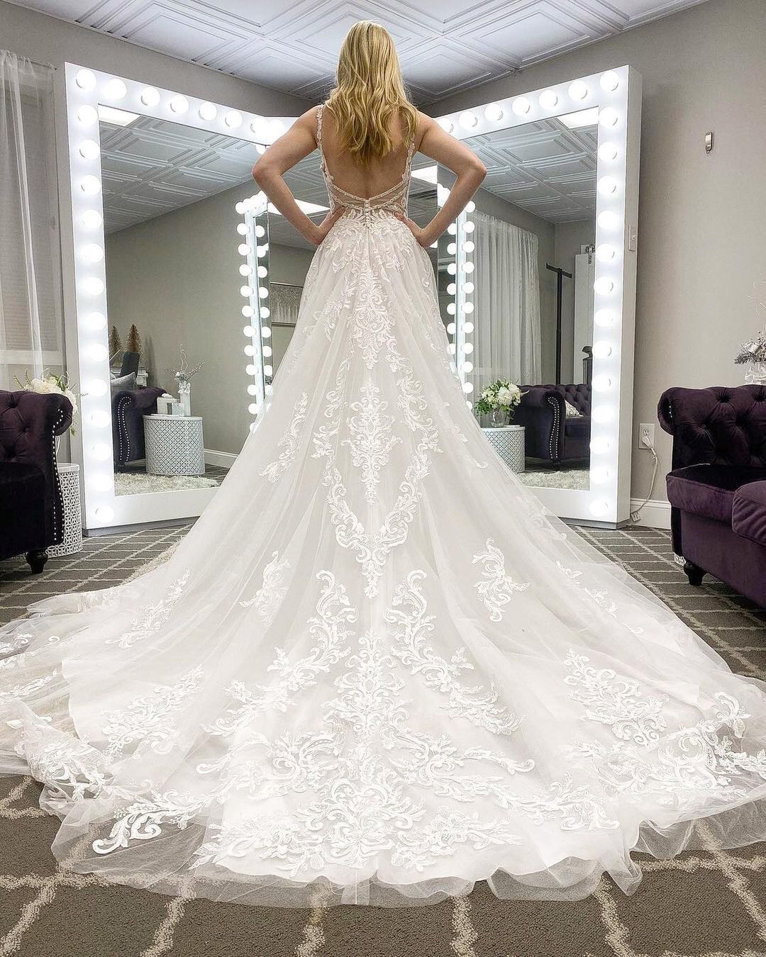 Elegant A-line Spaghetti Straps Deep V-neck Train Wedding Dress with Appliques Lace Tulle