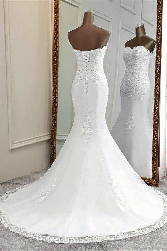 Elegant Strapless Mermaid Wedding Dress with Lace Appliques and Beadings