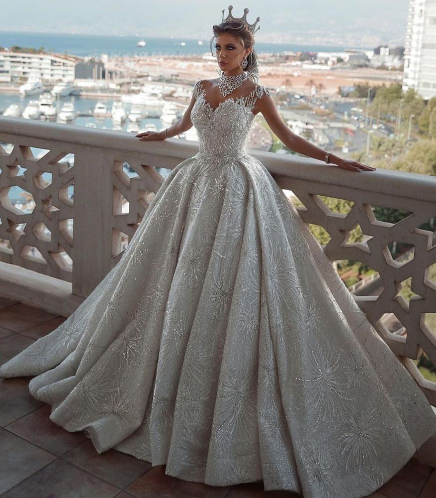 Glamorous Ball Gown Wedding Dress with Cap Sleeves and Beadings