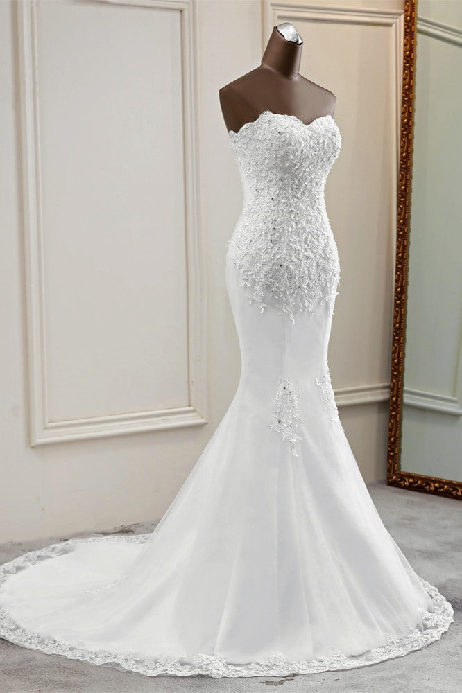 Elegant Strapless Mermaid Wedding Dress with Lace Appliques and Beadings