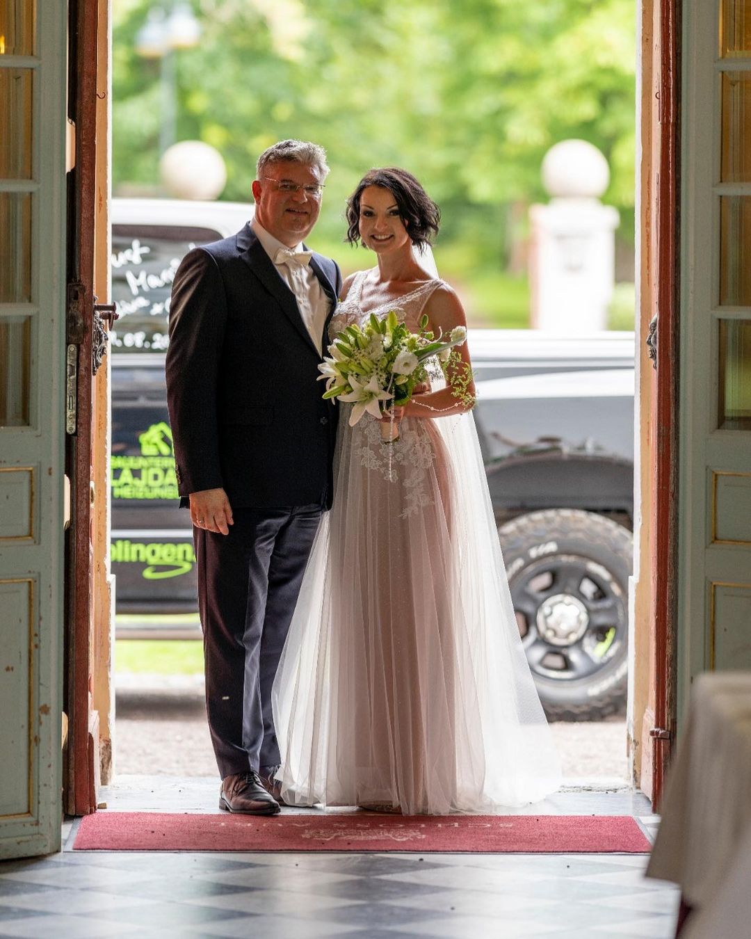 A-Line Wedding Dress with Lace Appliques and Backless Design - Simple Deep V-neck Floor-length Tulle