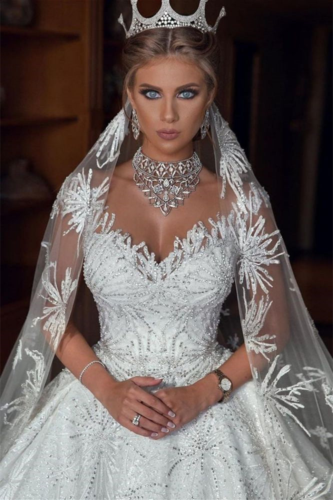 Glamorous Ball Gown Wedding Dress with Cap Sleeves and Beadings