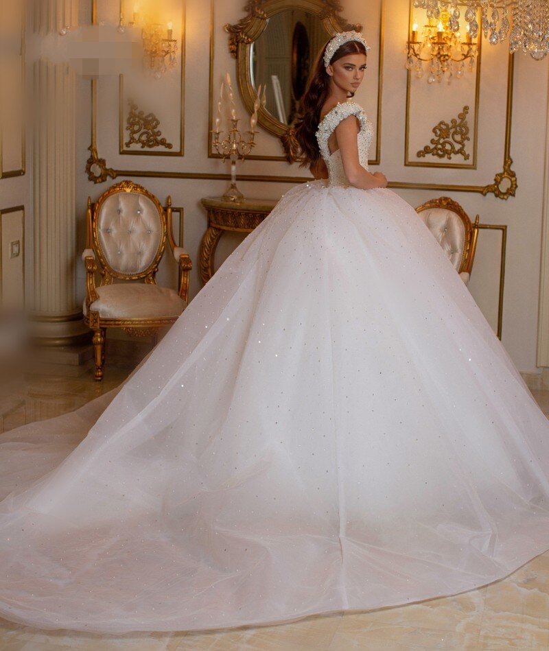 Glamorous Off-the-Shoulder Beaded Princess Wedding Dress with Pearl Tulle