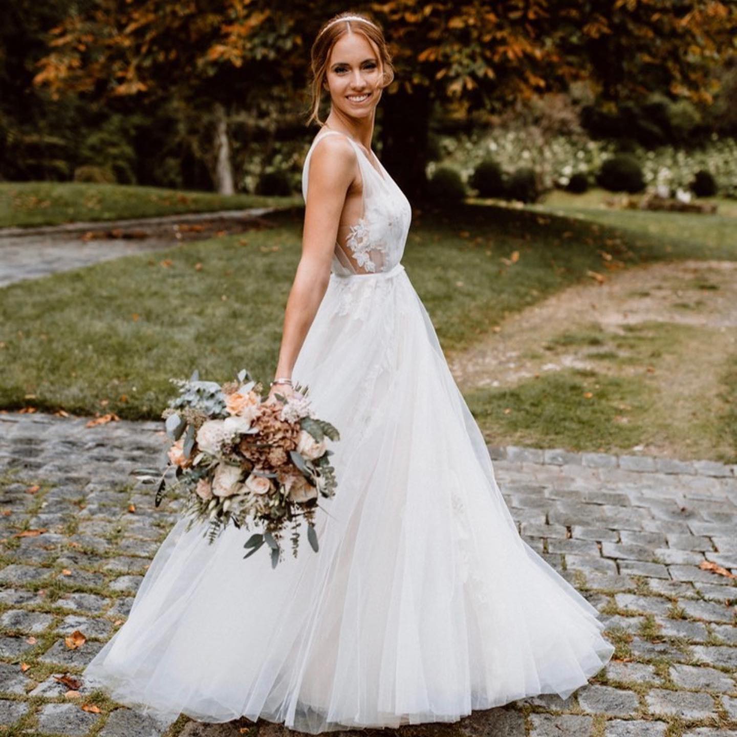 Stunning A-Line Deep V-neck Floral Wedding Dress with Open Back and Tulle Skirt